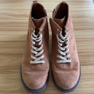 Combat boots say size 4 but actually fit size 7